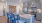 a kitchen with blue chairs